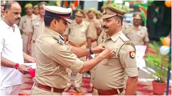 Mirzapur Lalganj police station in-charge Sanjay Kumar Singh received a silver medal