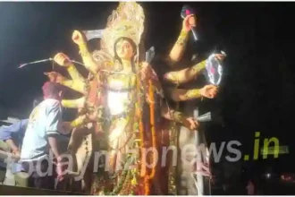 Narayanpur Public Durga Puja Committee immersed the idol with much fanfare on Monday night