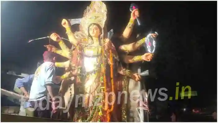 Narayanpur Public Durga Puja Committee immersed the idol with much fanfare on Monday night